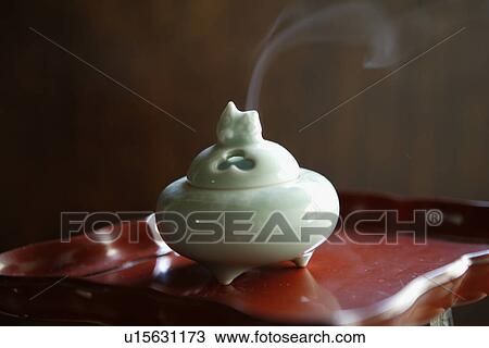 Close-up of white incense burner View Large Photo Image Stock Image - Close-up of white incense burner. Fotosearch
