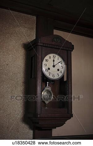 Stock Photo - View of a wall clock. Fotosearch