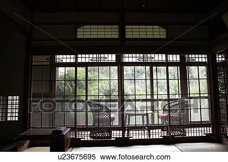Stock Photography - View of seating arrangement in a porch. Fotosearch