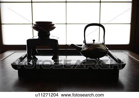 View of tea set on a table View Large Photo Image Picture - View of tea set on a table. Fotosearch