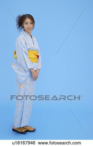 Stock Photograph - Portrait of a teenage girl in traditional outfit. Fotosearch
