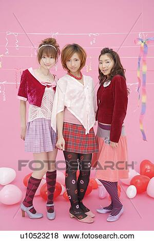 Stock Photo - Portrait of teenage girls. Fotosearch