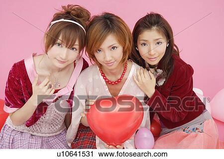 Stock Image - Portrait of teenage girls. Fotosearch