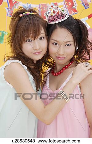 Stock Photo - Portrait of teenage girls. Fotosearch