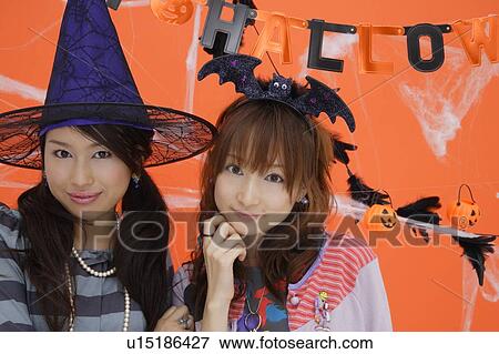 Portrait of teenage girls wearing fancy dress View Large Photo Image Stock Photo - Portrait of teenage girls wearing fancy dress. Fotosearch