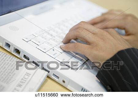 A close up of a woman hands seen typing on the laptop View Large Photo Image Stock Image - A close up of a woman hands seen typing on the laptop. Fotosearch