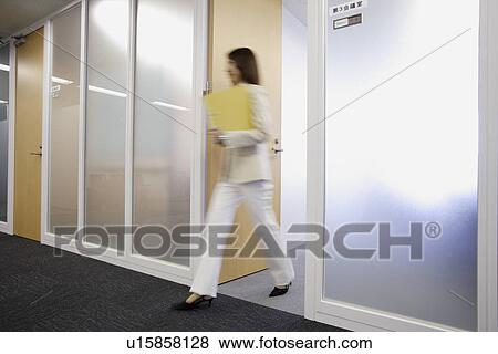 Businesswoman moving out of her cabin View Large Photo Image Stock Photo - Businesswoman moving out of her cabin. Fotosearch