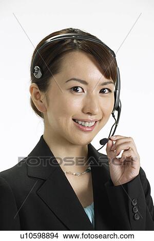 Young woman with a headphone, portrait View Large Photo Image Picture - Young woman with a headphone, portrait. Fotosearch