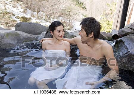 Couple in hot tub, smiling View Large Photo Image Stock Photo - Couple in hot tub, smiling. Fotosearch