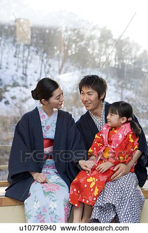 Family sitting beside the window in Yukata View Large Photo Image Stock Image - Family sitting beside the window in Yukata. Fotosearch