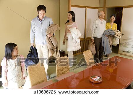 Stock Photography - Multi-generation family in the inn. Fotosearch