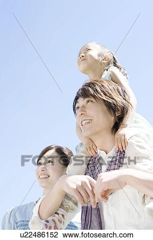 Stock Image - Family in the Yard. Fotosearch