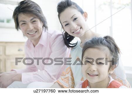 Family of Three in the Living Room View Large Photo Image Stock Image - Family of Three in the Living Room. Fotosearch