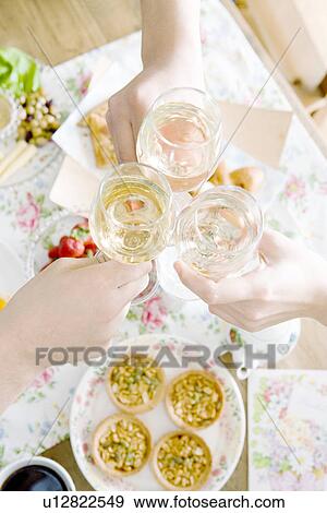 Stock Photo - Hands Toasting. Fotosearch