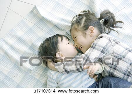 Sister and Brother View Large Photo Image Picture - Sister and Brother. Fotosearch