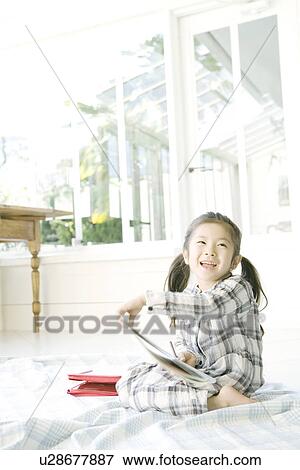 Stock Photo - Smiling Girl. Fotosearch