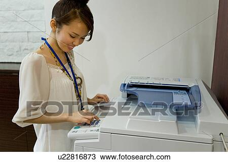 A Woman Making a Copy View Large Photo Image Stock Image - A Woman Making a Copy. Fotosearch