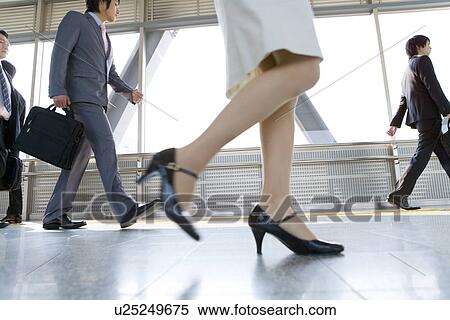 Stock Photography - Commuters at a Station. Fotosearch