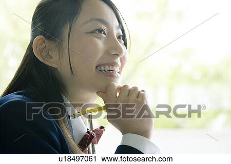 High school student in classroom, smiling View Large Photo Image Stock Image - High school student in classroom, smiling. Fotosearch