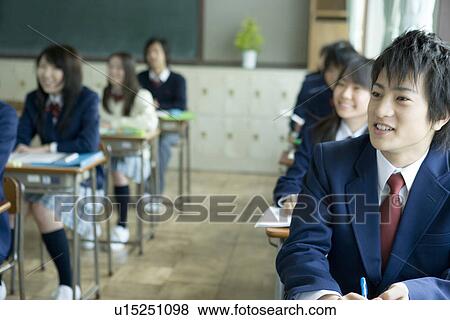 High school students in classroom, smiling View Large Photo Image Stock Photo - High school students in classroom, smiling. Fotosearch