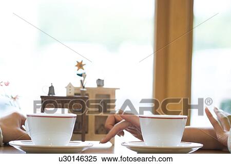 Stock Photography - Coffee cup and hands. Fotosearch