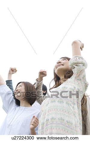 Group of young people clenching fists View Large Photo Image Stock Image - Group of young people clenching fists. Fotosearch