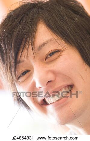 Stock Image - Portrait of young man. Fotosearch