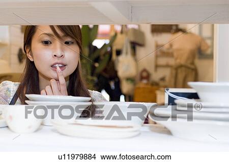 Picture - Young woman shopping. Fotosearch
