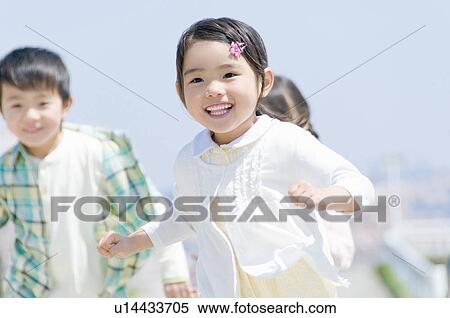 Boys and Girls Running and Smiling View Large Photo Image Stock Photography - Boys and Girls Running and Smiling. Fotosearch