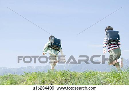 Stock Photo - Boys Running . Fotosearch