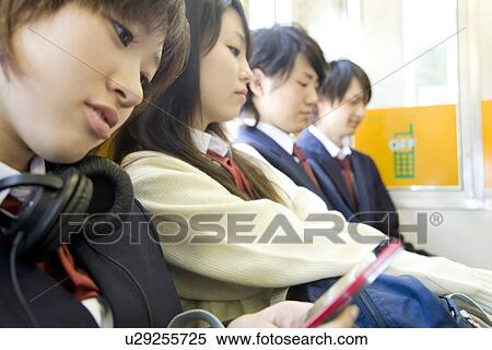 Stock Photography - High school students on the train. Fotosearch