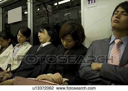 People on the train, sleeping on the seat View Large Photo Image Stock Image - People on the train, sleeping on the seat. Fotosearch