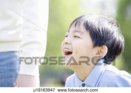 Father and Son Holding Hands View Large Photo Image Stock Photo - Father and Son Holding Hands. Fotosearch