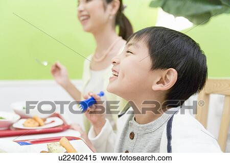 Mother and Son Having Lunch in Restaurant View Large Photo Image Stock Photography - Mother and Son Having Lunch in Restaurant. Fotosearch