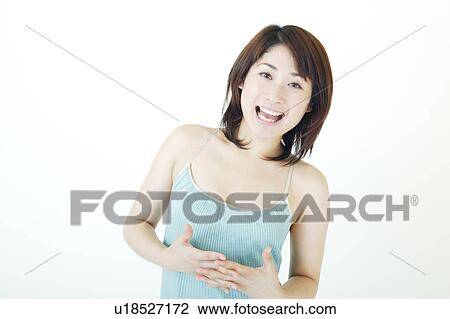 Stock Image - A young woman smiling. Fotosearch