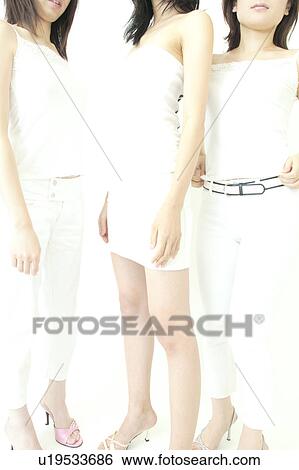 Three Unrecognizable women standing View Large Photo Image Stock Photograph - Three Unrecognizable women standing. Fotosearch
