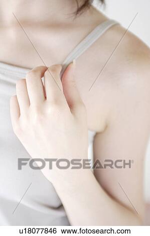 Stock Photograph - Unrecognizable woman wearing camisole. Fotosearch