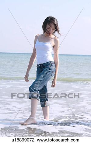 A young woman in beach View Large Photo Image Stock Image - A young woman in beach. Fotosearch