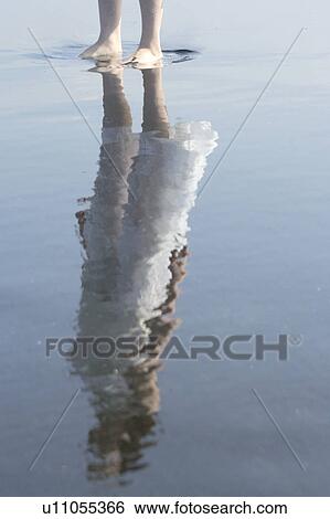 A young woman in beach View Large Photo Image Stock Photograph - A young woman in beach. Fotosearch
