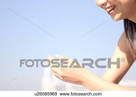 Stock Photo - Close-up of a young woman. Fotosearch