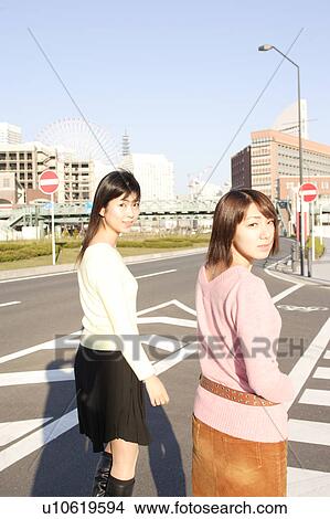 Picture - Two women walking . Fotosearch