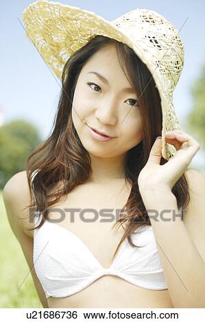 Stock Photograph - Portrait of a young woman in bikini. Fotosearch