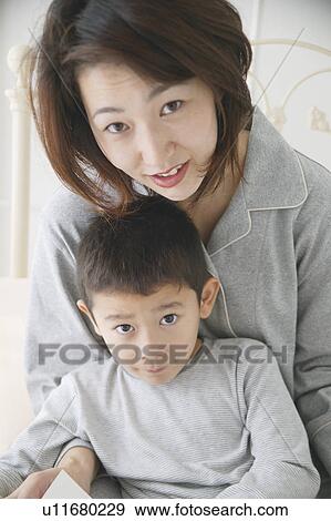 Portrait of mother and son View Large Photo Image Stock Photo - Portrait of mother and son. Fotosearch