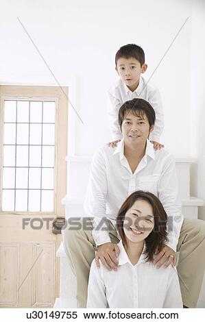 Stock Photography - Portrait of a family. Fotosearch