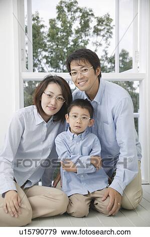 Portrait of a family with glasses View Large Photo Image Stock Photo - Portrait of a family with glasses. Fotosearch