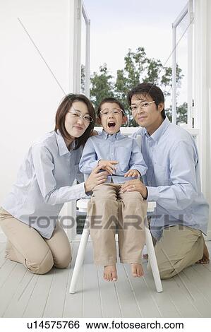Portrait of a family with glasses View Large Photo Image Stock Photograph - Portrait of a family with glasses. Fotosearch