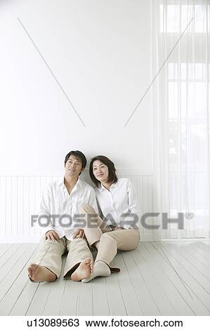 Stock Image - Portrait of adult couple. Fotosearch