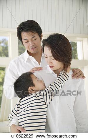 Portrait of parents and a son View Large Photo Image Stock Photo - Portrait of parents and a son. Fotosearch