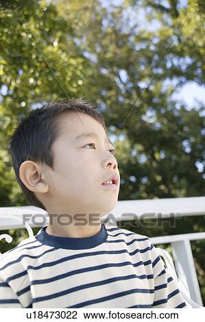 Boy looking ahead View Large Photo Image Stock Image - Boy looking ahead. Fotosearch