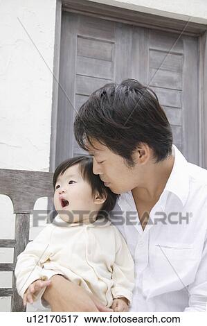 Father holding baby girl View Large Photo Image Stock Photo - Father holding baby girl. Fotosearch